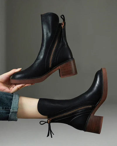 Maureen™ | Black leather boots with a comfortable heel, elegant and timeless