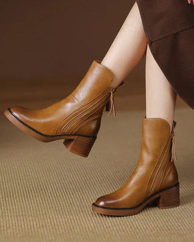 Maureen™ | Black leather boots with a comfortable heel, elegant and timeless